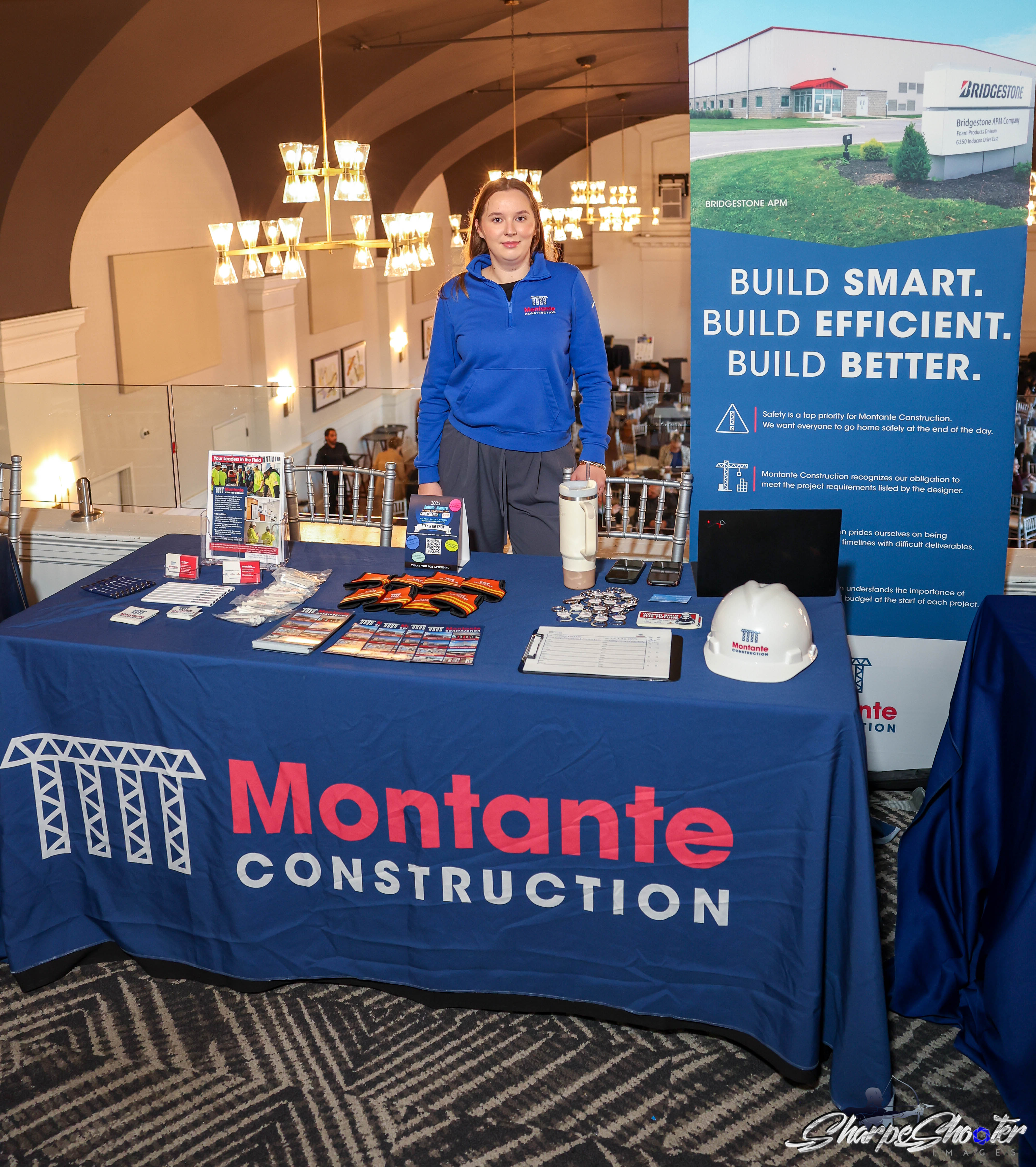 Montante Construction's branded exhibitor table on the Expo floor