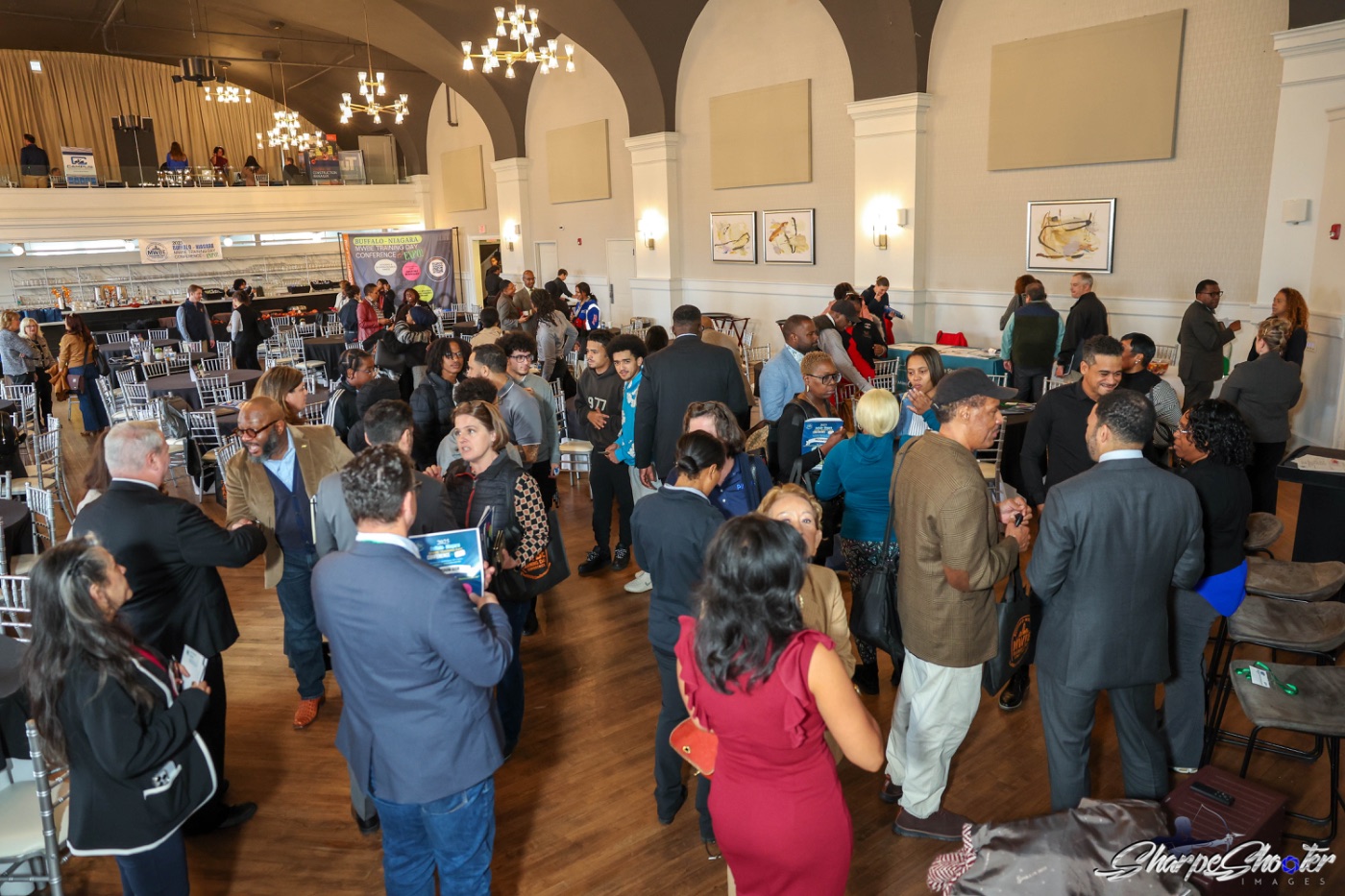 Business owners filling the floor between sessions